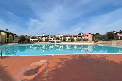 Image de Appartement 'Poggio Al Sole' avec piscine partagée, Wi-Fi et climatisation