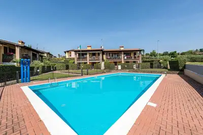 Image de Appartement \"Al Tulipano\" avec piscine, Wi-Fi et terrasse