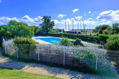 Image de Appartement pour 5 pers. avec terrasse et accès piscine à Arzon