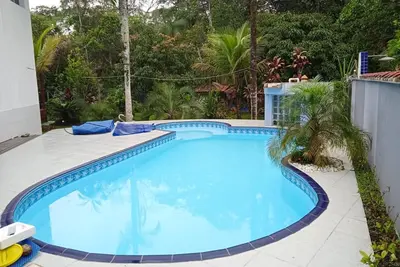 Image de Linda casa com lazer a 500m da praia Guaratuba/Sp