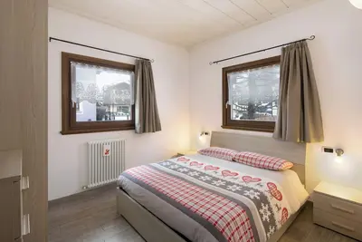 Image de Appartement de vacances \"Arcobaleno Viola\" avec vue sur les montagnes, Wi-Fi et jardin