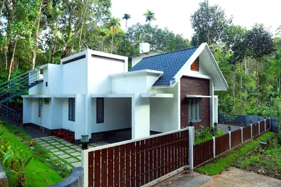 Image de 3 Bedroom Villa surrounded by Munnar's mesmerizing beauty of cascading mountains