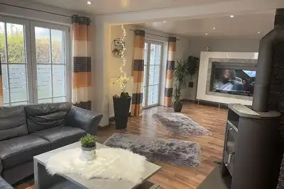 Image de Cozy vacation home with small fenced garden and large terrace