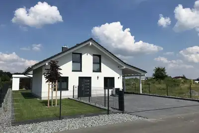 Image de Vacation home Oskar on the lake with private beach for 4 adults, fireplace, boat and sauna