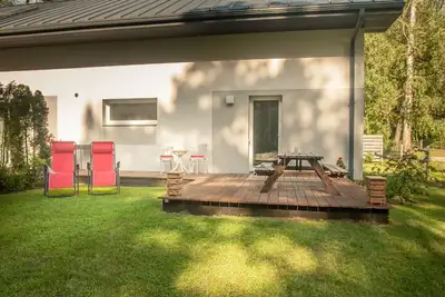 Image de Apartment with a cozy terrace and a view of the pine trees