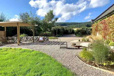 Image de Fun & cosy luxury cottage with great views, large garden, nearby woods & beaches