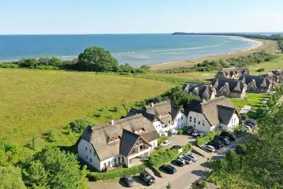 Image de Close to the beach with balcony, use of swimming pool and sauna - Strandhaus Mönchgut FeWo12