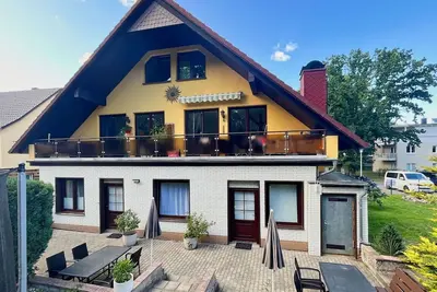 Image de In a quiet location, free use of swimming pool and sauna - Ferienhus Baabe FeWo 01 -