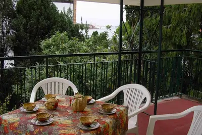 Image de Apartment with panoramic terrace in villa with garden