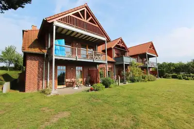 Image de Haus Sonnenblume - idyllic location, vacation apartment with terrace, sea view - House