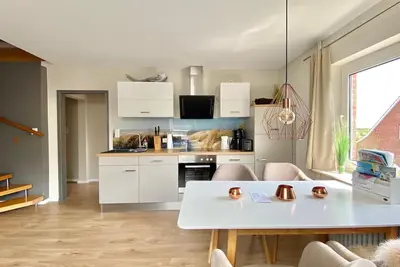 Image de Vacation apartment \"Marlon\" in the vacation home Wilken's Hus for 2-4 persons on the outskirts of the village.