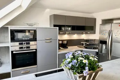 Image de Vacation apartment -Jakob- in the vacation domicile \"PaPaJa\" on the upper floor with a large roof terrace.