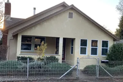 Image de Quaint two bedroom residential home with wood stove
