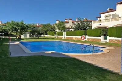 Image de Maison JUMELÉE Avec Piscine Communautaire À 400 Mt De Playa Cristal