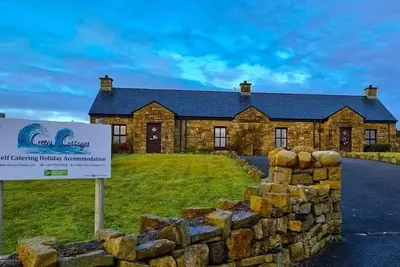 Image de The Moor by Creevy Cottages are 1 minute to pier / sea