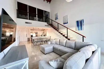 Image de Beautiful top floor beach front condo in the center of cap cana.