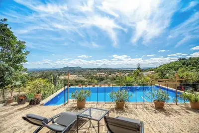 Image de Maison de campagne \"Can Pulit\" avec piscine, jardin, climatisation et Wi-Fi