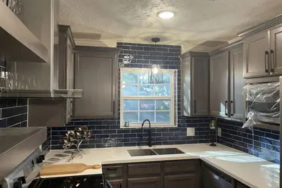 Image de Cosy🔥 4 bedroom home with big backyard