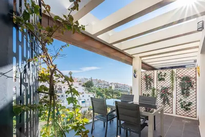 Image de Penthouse with roof terrace at walking distance of beach