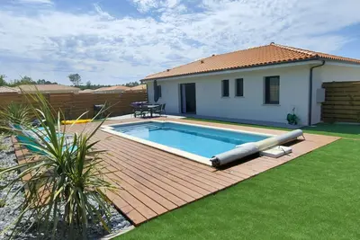 Image de Propriété neuve avec piscine chauffée privative proche océan classée 3 étoiles