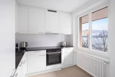 Roomy Oerlikon 3. 5 Room w/ Parking, 1min to Train Station, by Blueground