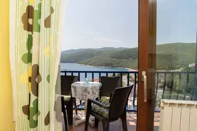 Image de Appartement de vacances avec balcon et vue sur la mer