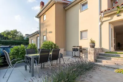 Image de Maison de vacances avec jardin, grill et terrasse