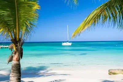 Chic condo steps away from the ocean on west bay beach!