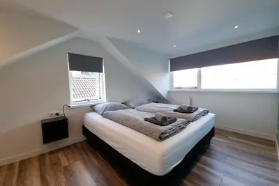 Image de Modern styled holiday home at the base of the dunes, nearby beach and sea!