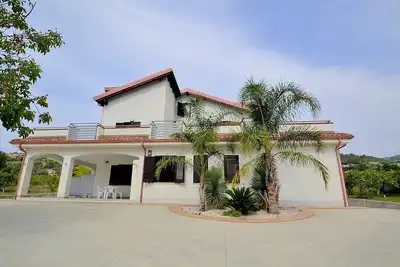 Image de Villa Olga F: A cozy and welcoming apartment that is part of a villa situated in a quiet location, a few minutes from the town center, with Free Wi-Fi.