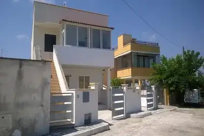 Image de Maison de vacances 'Trilo Torre dell Orso 5 posti Pt33' près de la plage