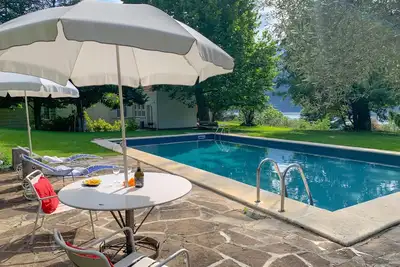 Image de Villa \"Pitti\" près du lac de Côme avec piscine, jardin et terrasse