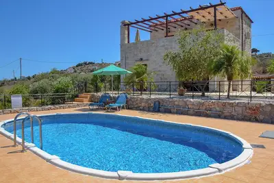 Image de Villa Almyros, villa de luxe, vue sur la mer, piscine privée et outdoor living
