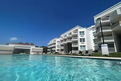 Image de Poolside Penthouse on Natural Caribbean Beach - listing updated December 2025