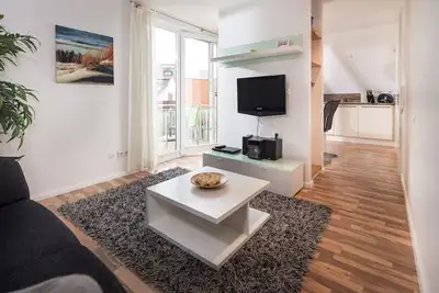 Image de Apartment Dünenwind in the house Dünensand