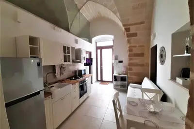 Image de \"Casa Mimà\": characteristic architecture of the historic center with a modern style.