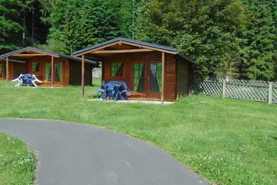 Image de Squirrel\" log cabin at the Gelenau outdoor pool