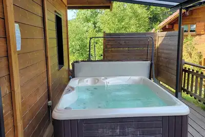 Image de chalet castor avec spa et jeux