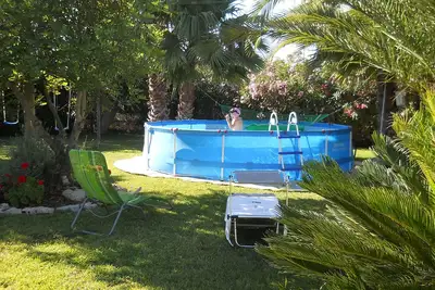 Image de Villetta dei Cocus à quelques minutes de la mer avec jardin et piscine hors sol
