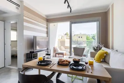 Chic Urban Getaway with Balcony