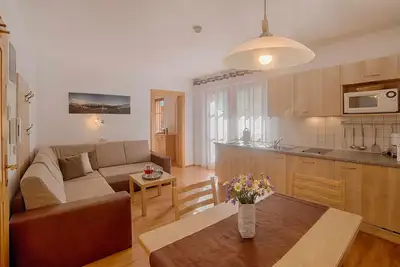 Image de Appartement \"Löfflerblick A Weisszint\" avec vue sur les montagnes, Wi-Fi, sauna et jacuzzi