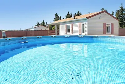 Image de Maison 'Eloy Playa 3 - Sólo Familias' avec piscine, jardin & Wi-Fi