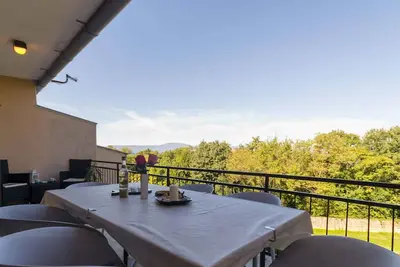Image de Appartement de vacances avec air conditionné et vue sur la mer