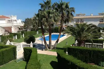 Maison dans une petite résidence  proche de la plage, avec piscine