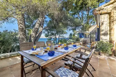 Image de Can Blau, mediterranean style with sea views