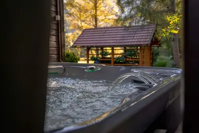 A place where you can relax in hot tub and enjoy the beautiful natur
