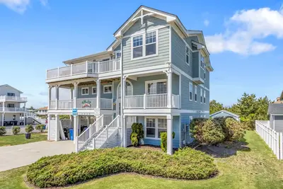 Spacious home across from the beach with partial ocean views, pool, & pool table