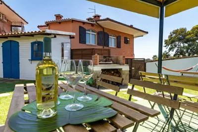 Image de Appartement 'Sa Domu Manna' avec vue sur la mer, terrasse, jardin partagé et Wi-Fi