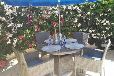 Image de Rez-de-chaussee d'un duplex avec piscine prive