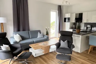 Image de 49. 0. S Waterkant - Modern vacation apartment, first floor, sauna, large balcony,